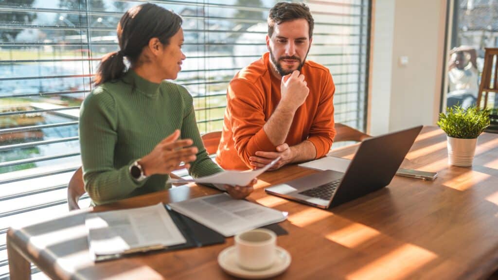 Couple reviewing buying down the rate options