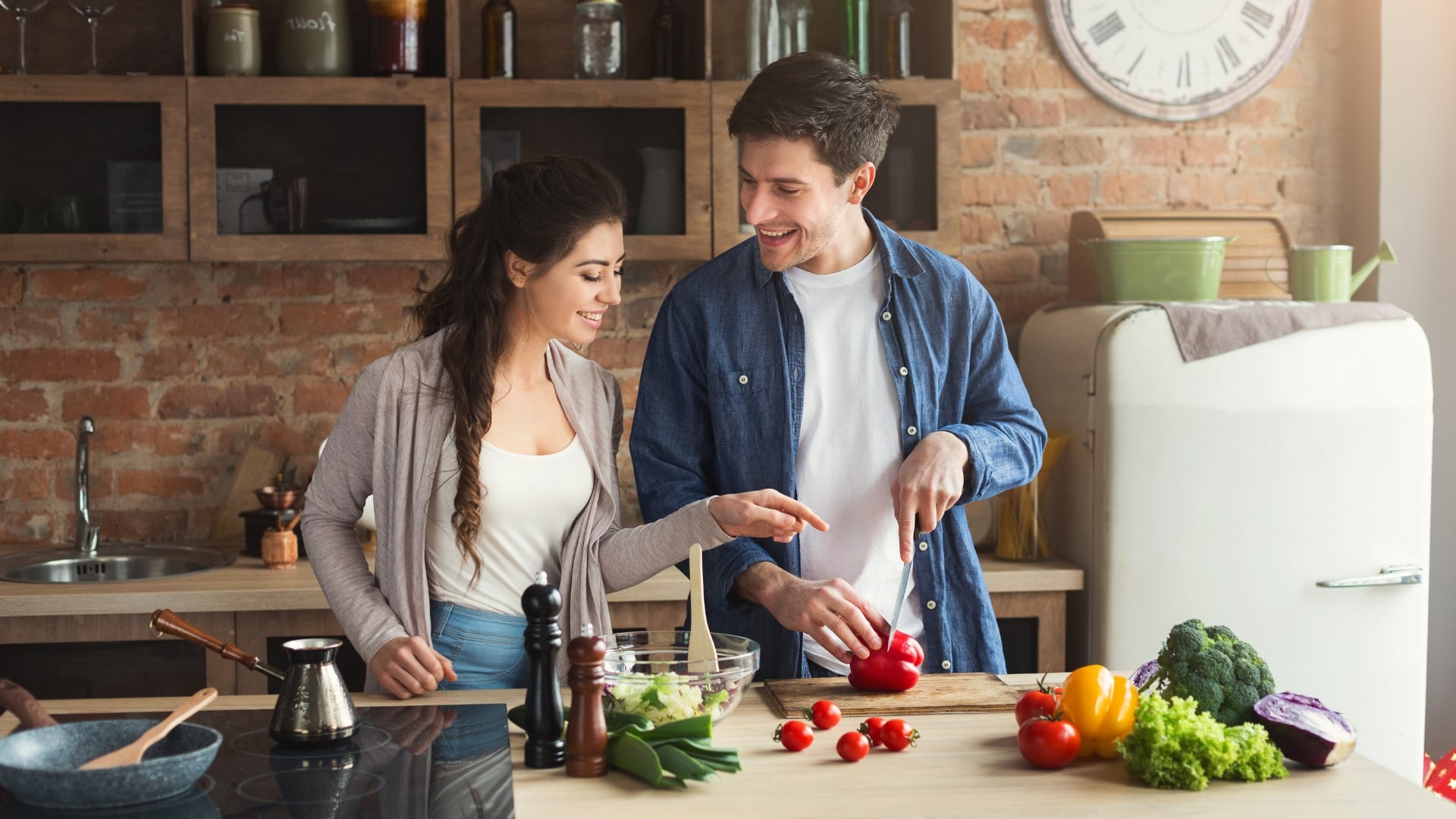 California homebuyers cooking in their new kitchen