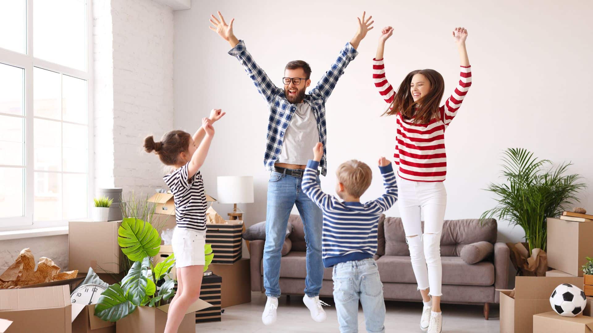 family celebrating after buying a home with bad credit